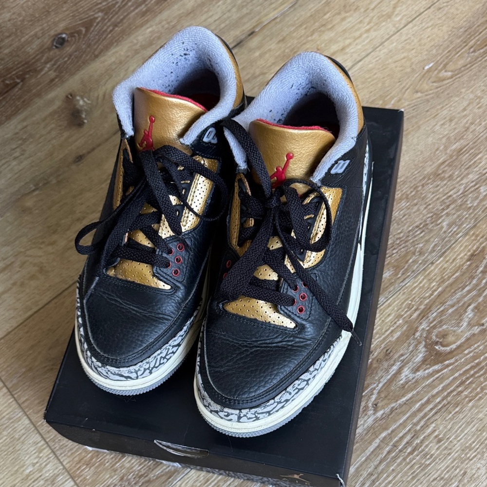 Nike Jordan 3 Retro Black and Gold Sneakers with Red Accents